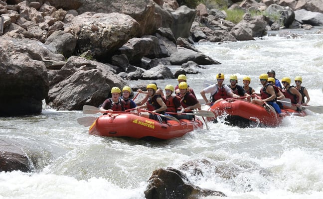 Guided whitewater rafting through the Royal Gorge rapids on the Arkansas River, Colorado